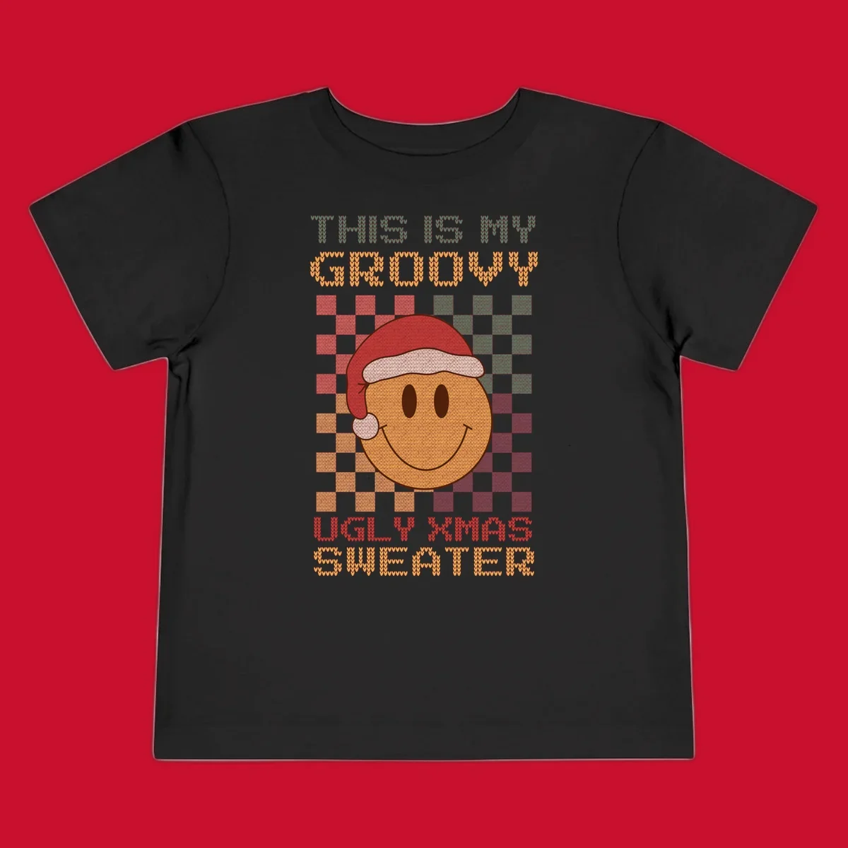 Groovy ugly Christmas sweater design with smiley face, Santa hat, and text.