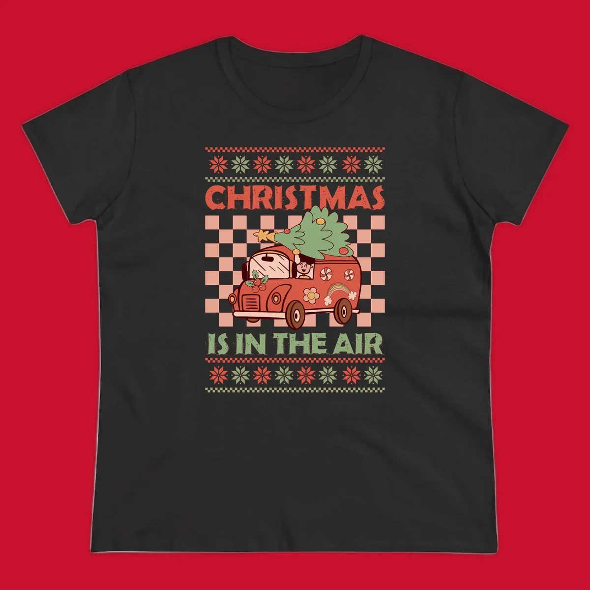 Christmas van with tree on top, text 'Christmas Is In The Air', snowflake borders, checkered pattern.