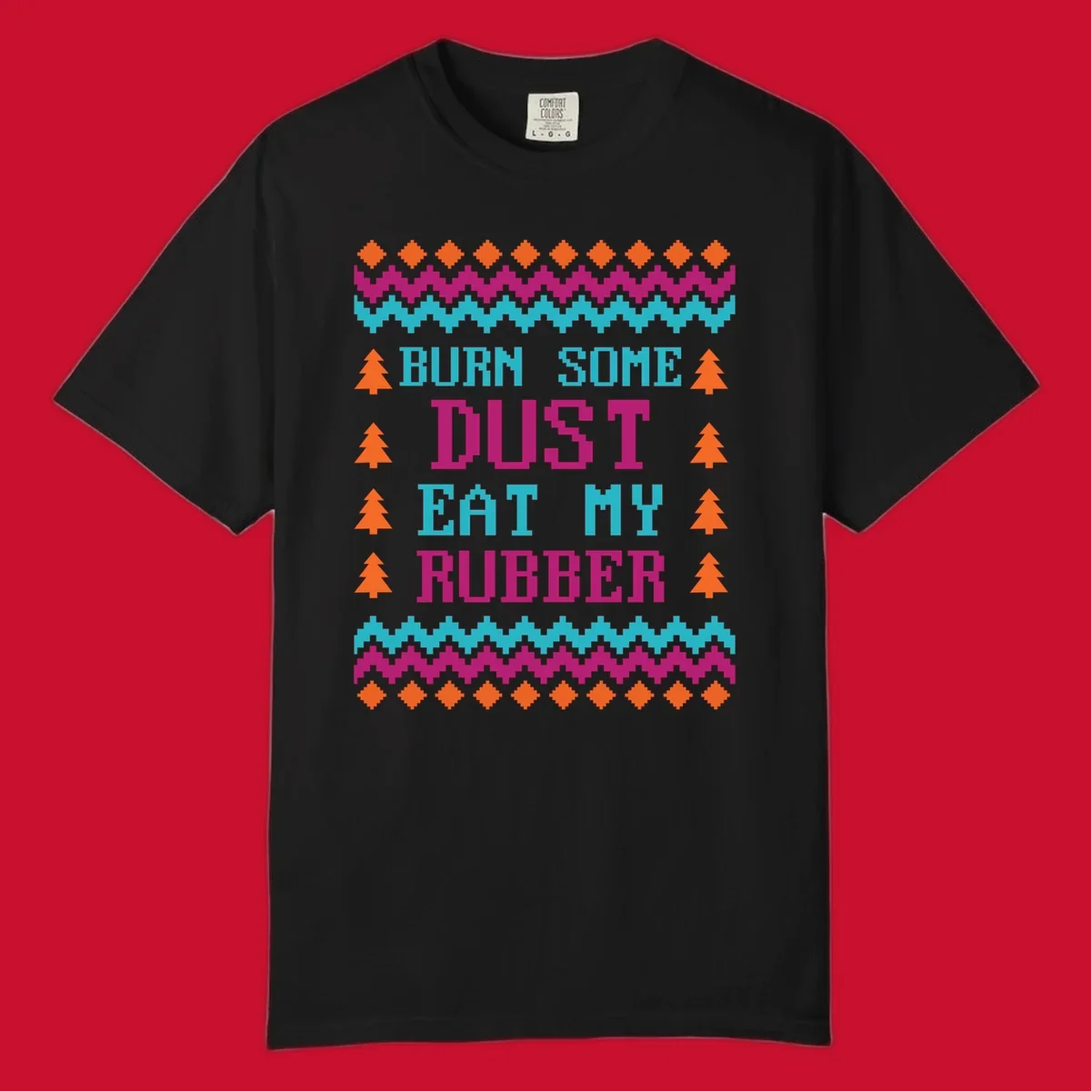 Pixelated text design 'BURN SOME DUST EAT MY RUBBER' with Christmas trees and zig-zag patterns.