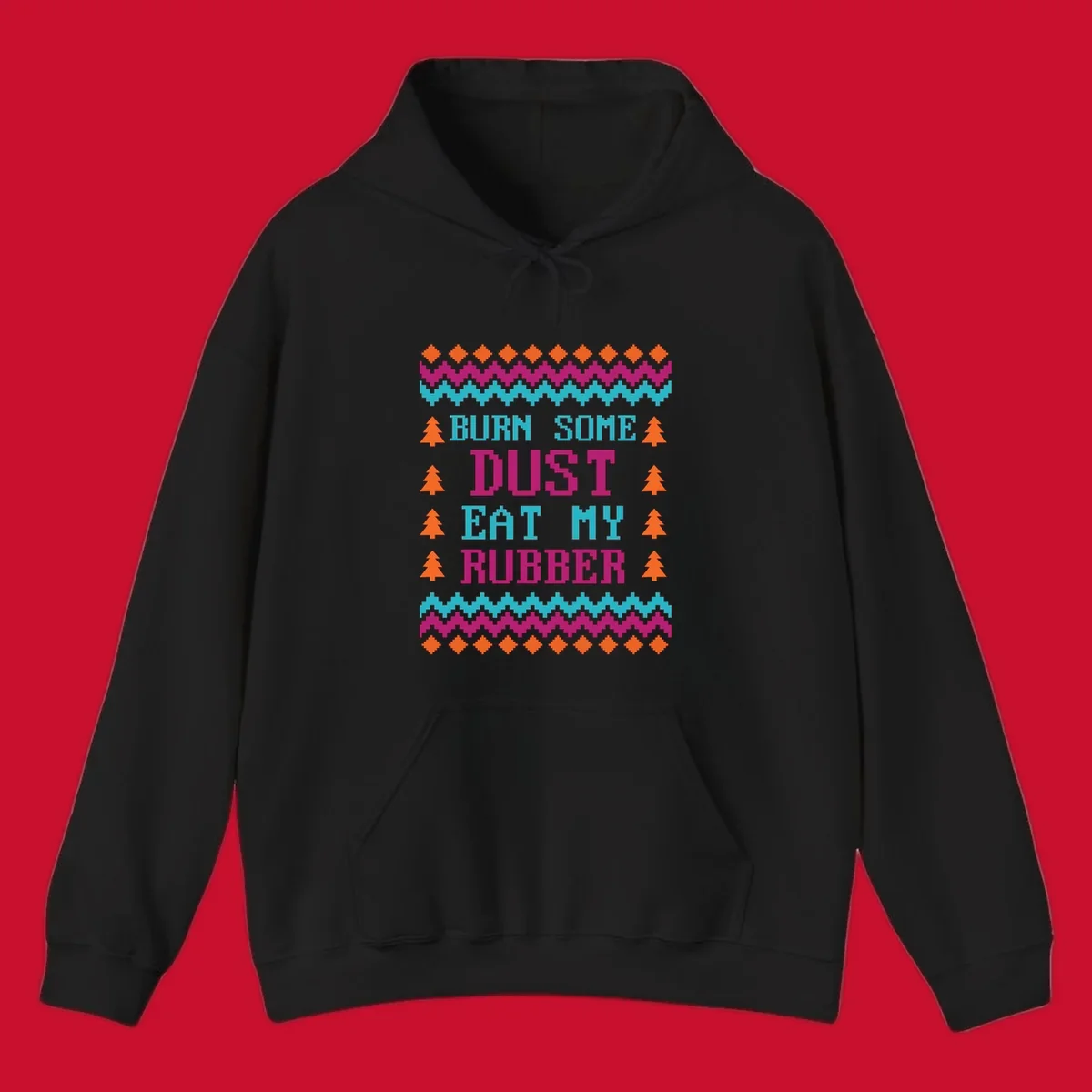 Pixelated text design 'BURN SOME DUST EAT MY RUBBER' with Christmas trees and zig-zag patterns.