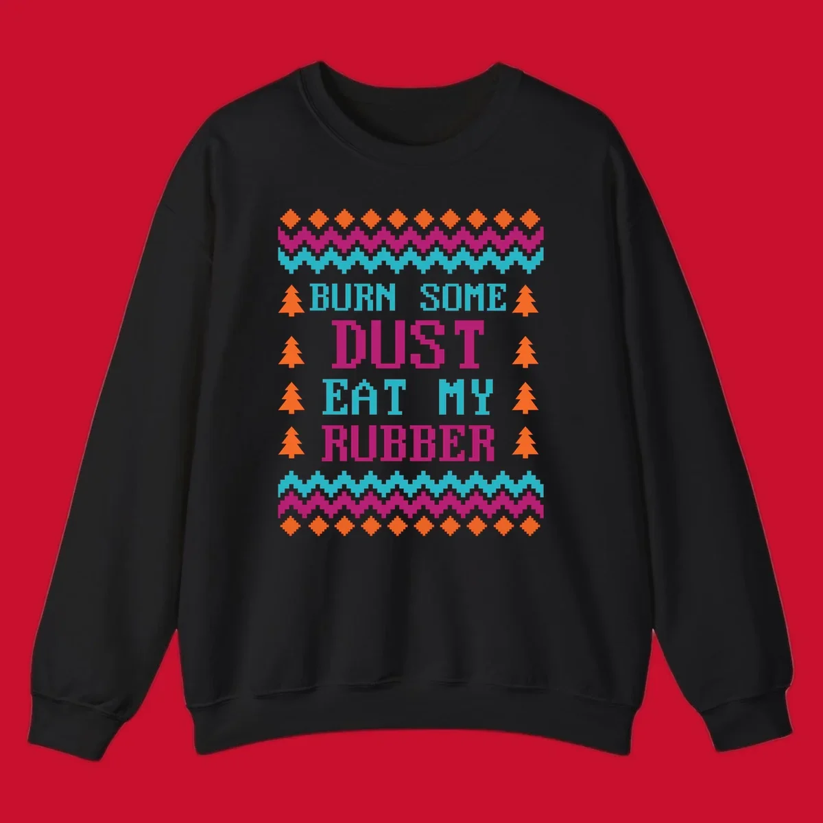 Pixelated text design 'BURN SOME DUST EAT MY RUBBER' with Christmas trees and zig-zag patterns.