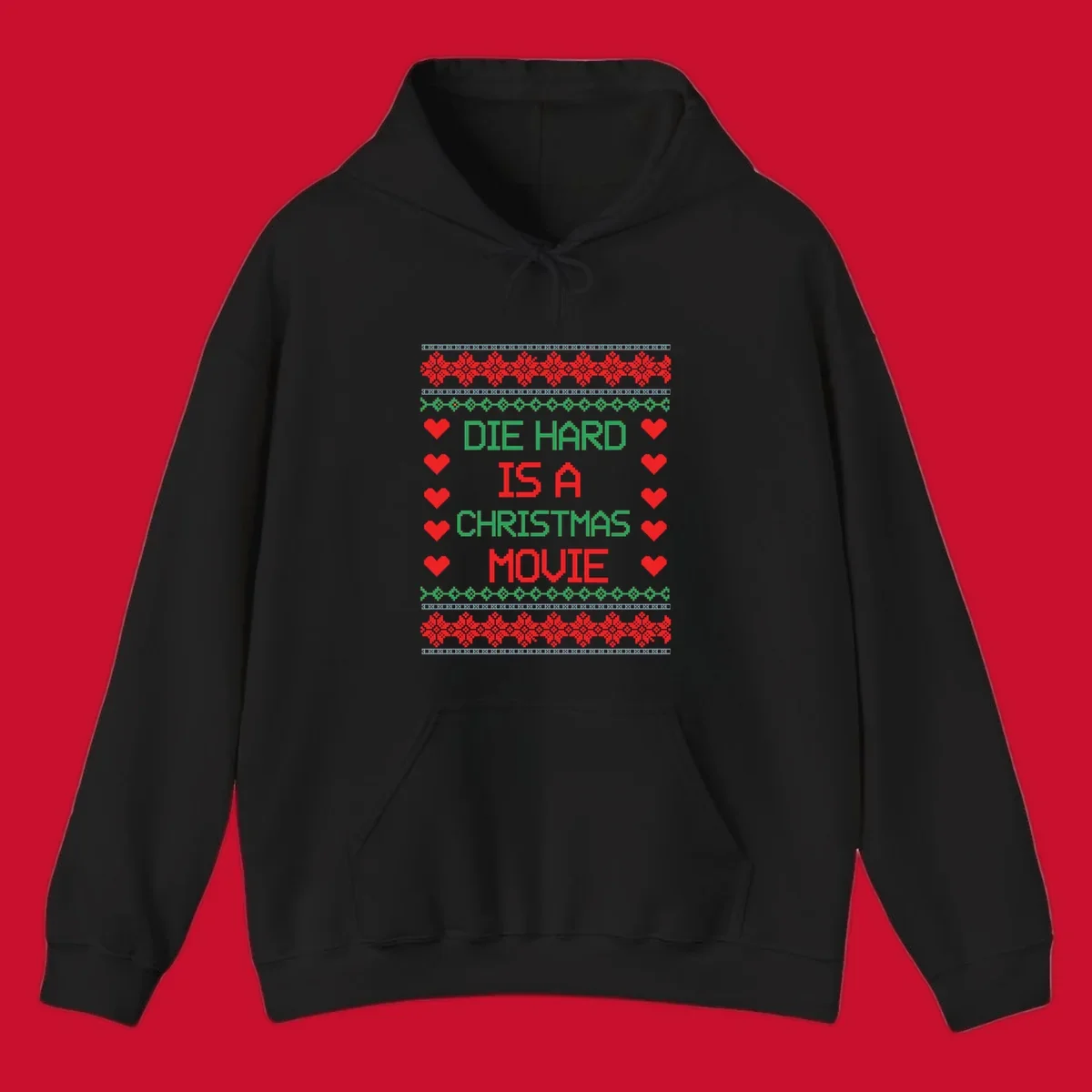 Die Hard is a Christmas Movie pixel art design with red hearts and holiday patterns.