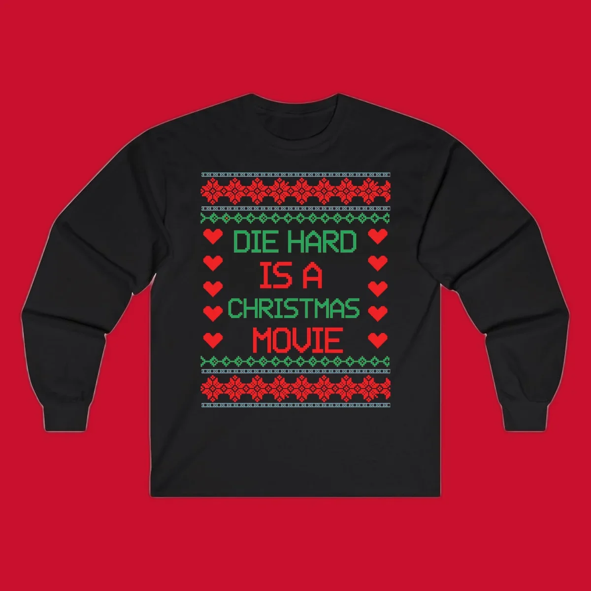 Die Hard is a Christmas Movie pixel art design with red hearts and holiday patterns.