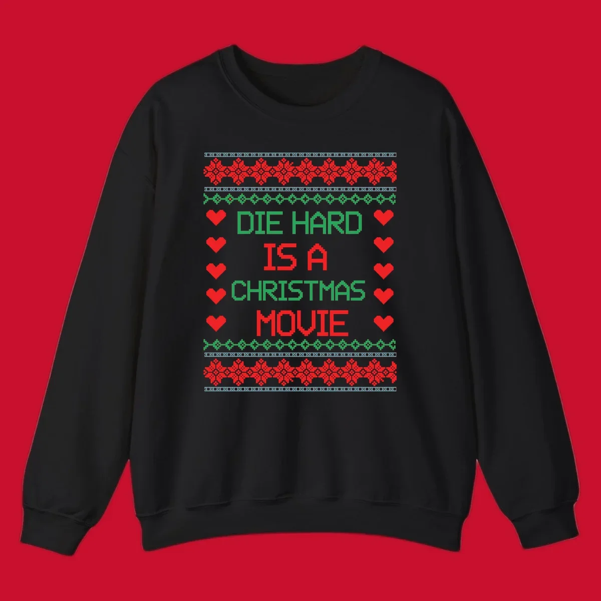 Die Hard is a Christmas Movie pixel art design with red hearts and holiday patterns.