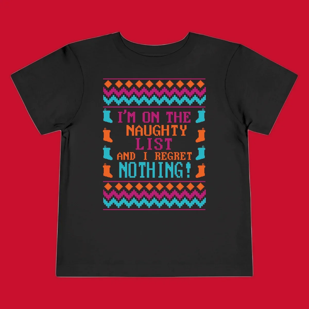 I'm On The Naughty List And I Regret Nothing pixelated text design with Christmas stockings and geometric borders.