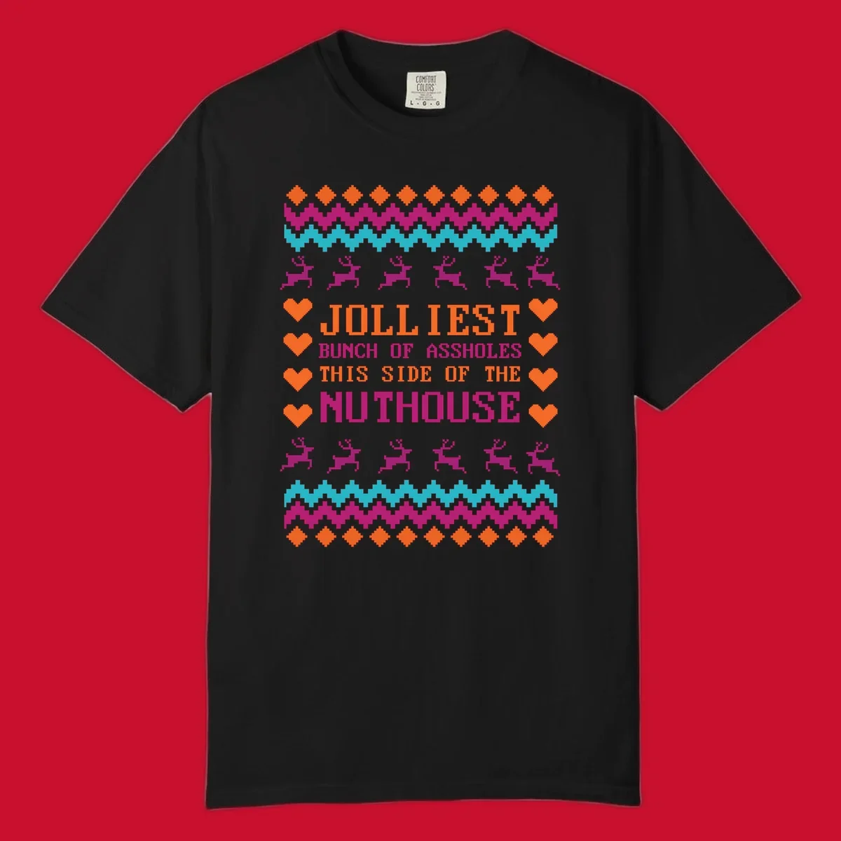 Jolliiest Bunch Of Assholes text with reindeer and heart graphics in an ugly sweater pattern.