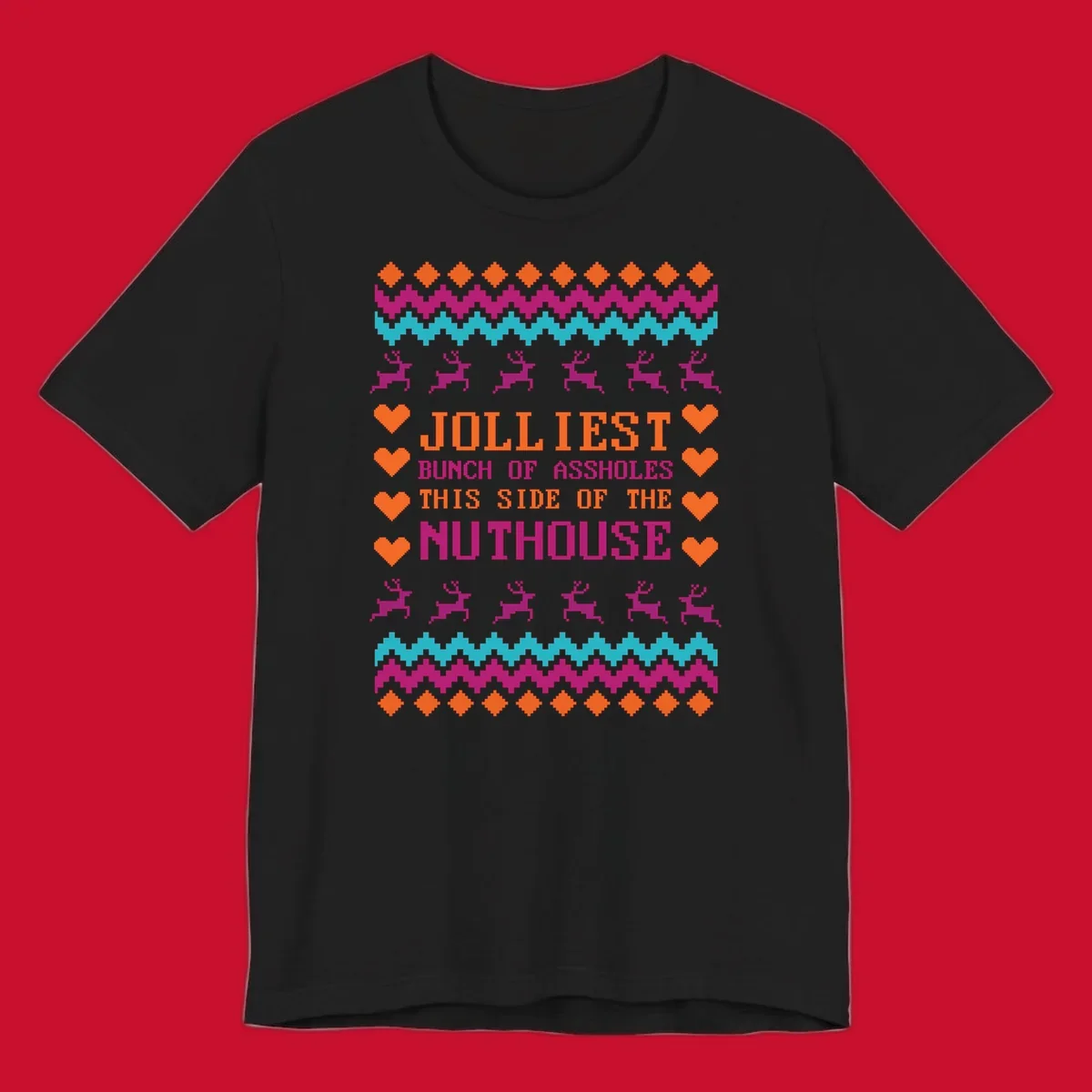 Jolliiest Bunch Of Assholes text with reindeer and heart graphics in an ugly sweater pattern.