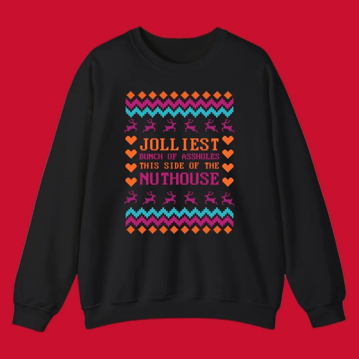 Jolliiest Bunch Of Assholes text with reindeer and heart graphics in an ugly sweater pattern.