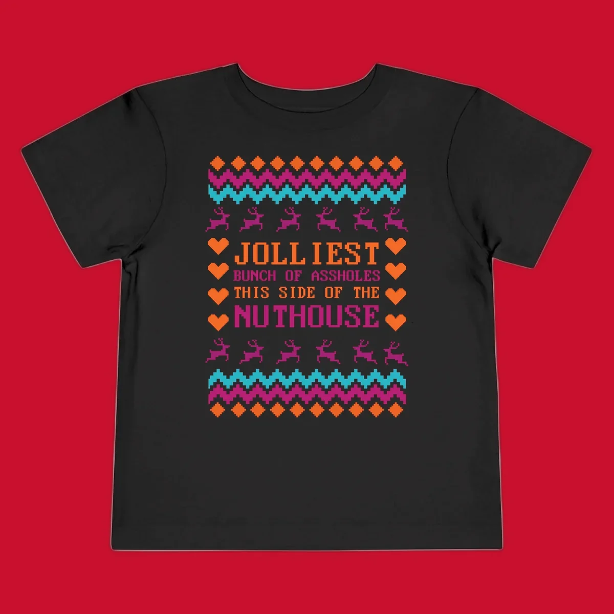 Jolliiest Bunch Of Assholes text with reindeer and heart graphics in an ugly sweater pattern.
