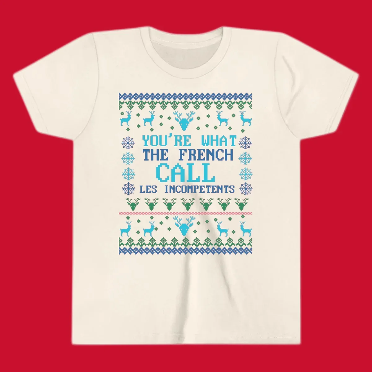 French Call Les Incompetents Ugly Christmas Sweater design with reindeer and snowflakes.