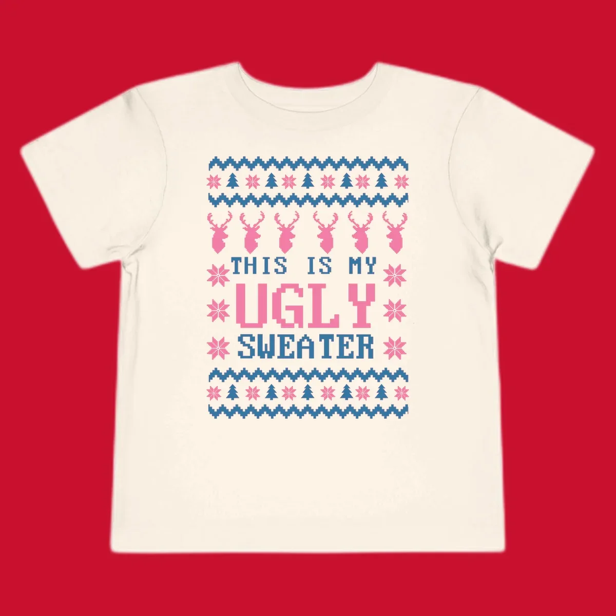 Ugly Christmas sweater design with pixelated reindeer, snowflakes, trees, and text 'THIS IS MY UGLY SWEATER'.