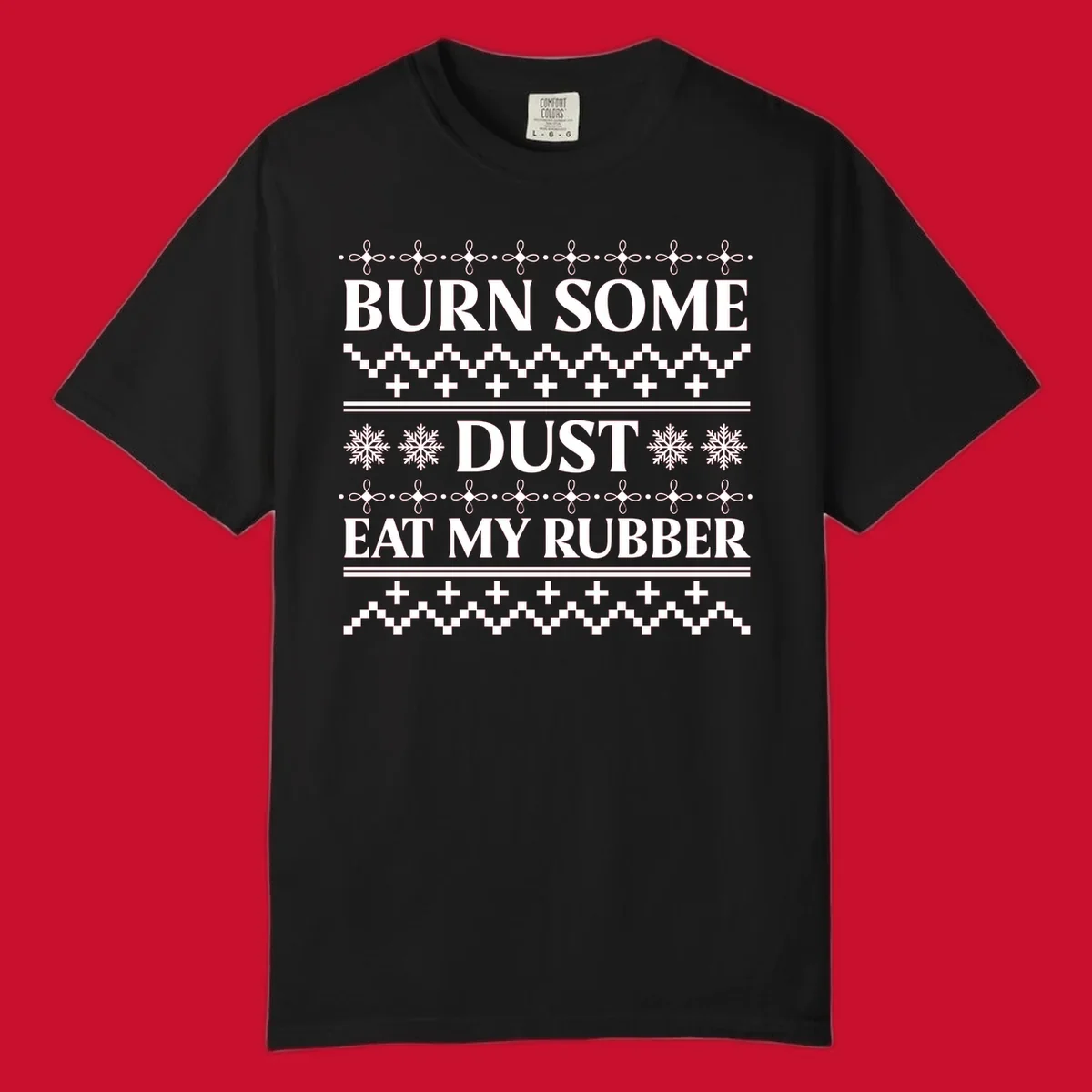 Burn some dust eat my rubber text with snowflakes and geometric patterns, an ugly christmas sweater design.