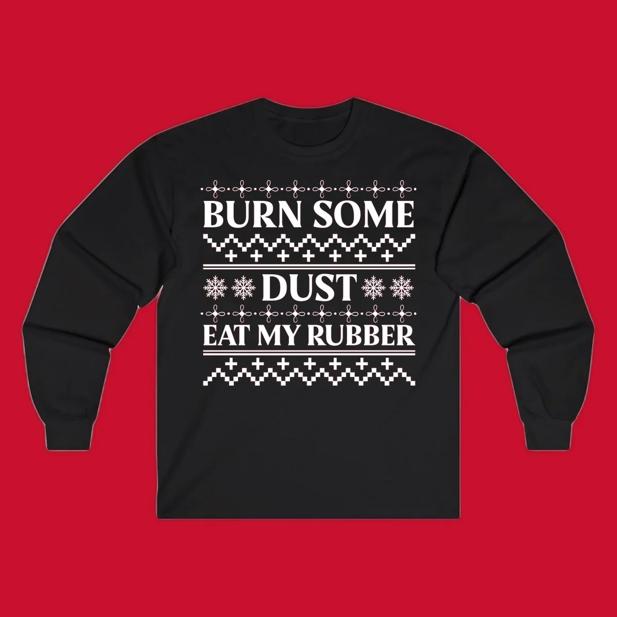 Burn some dust eat my rubber text with snowflakes and geometric patterns, an ugly christmas sweater design.