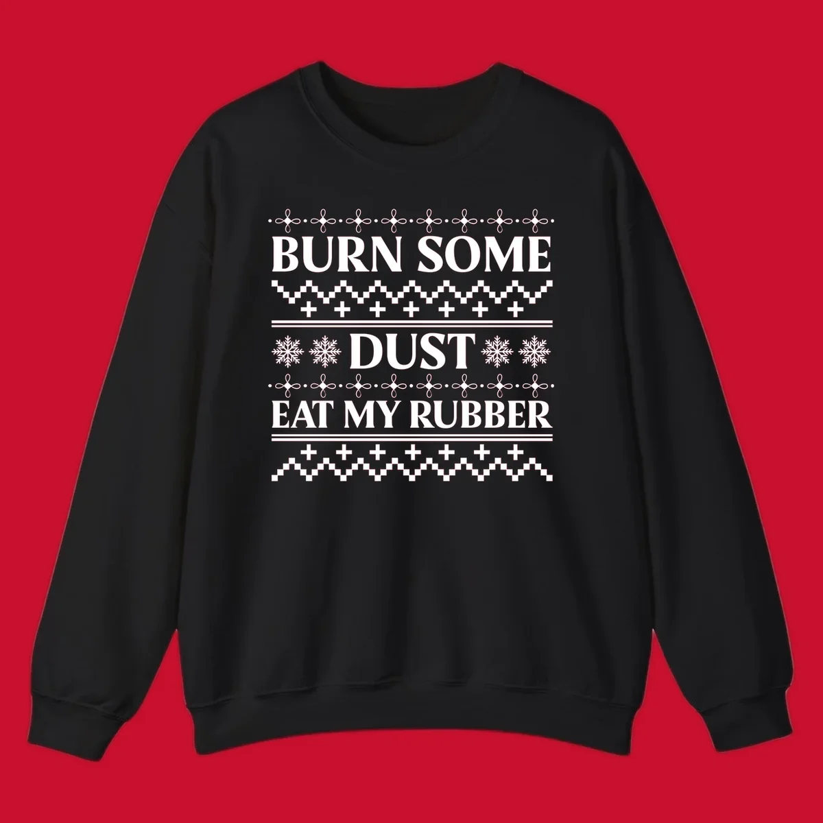 Burn some dust eat my rubber text with snowflakes and geometric patterns, an ugly christmas sweater design.