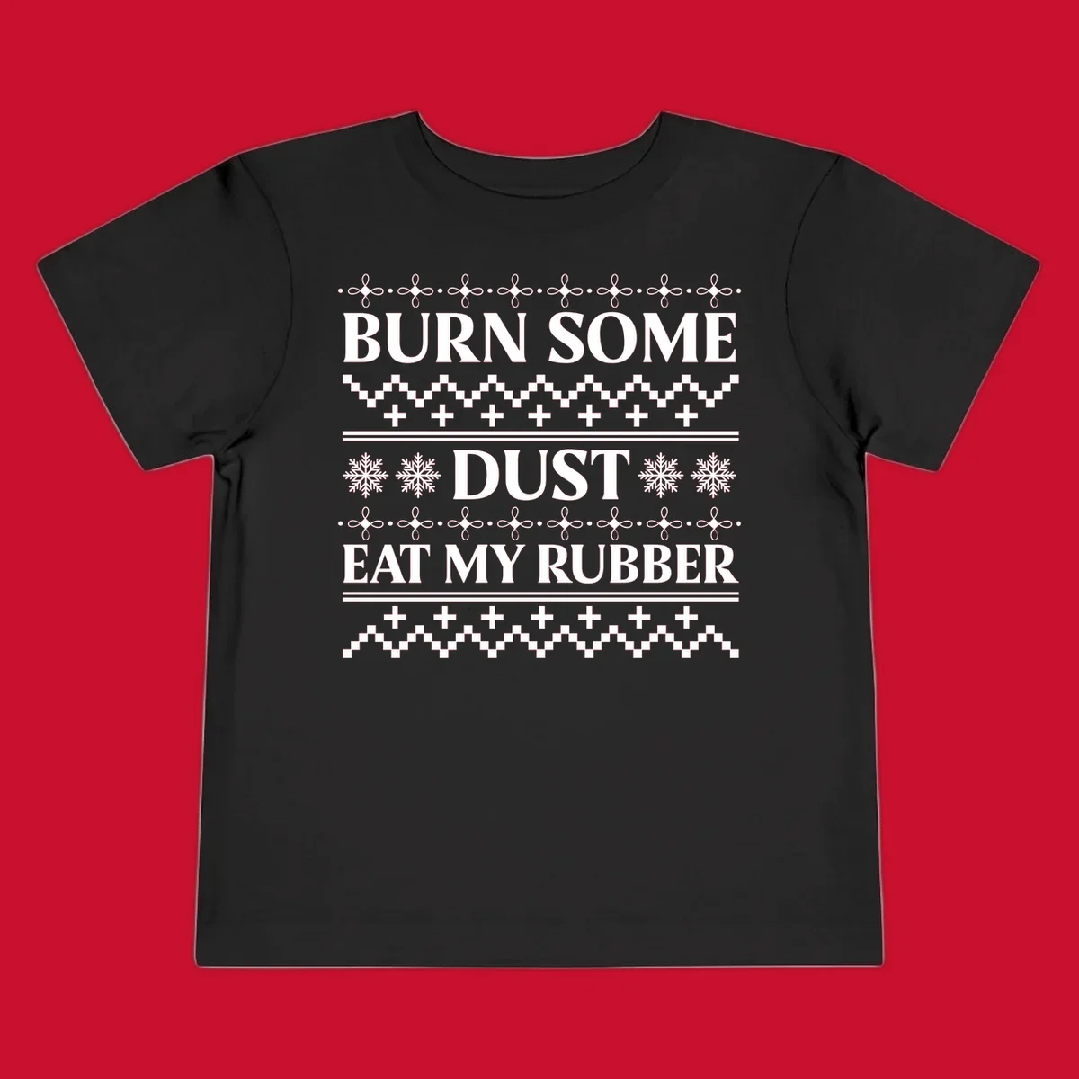 Burn some dust eat my rubber text with snowflakes and geometric patterns, an ugly christmas sweater design.