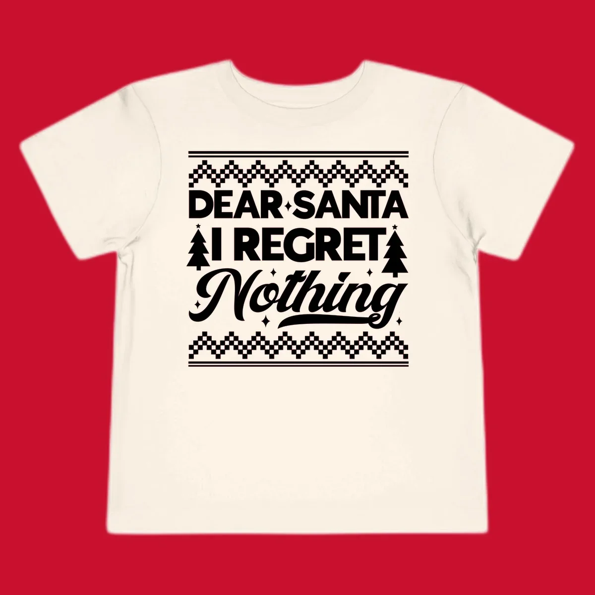 Dear Santa I Regret Nothing Christmas design with trees and sparkles.