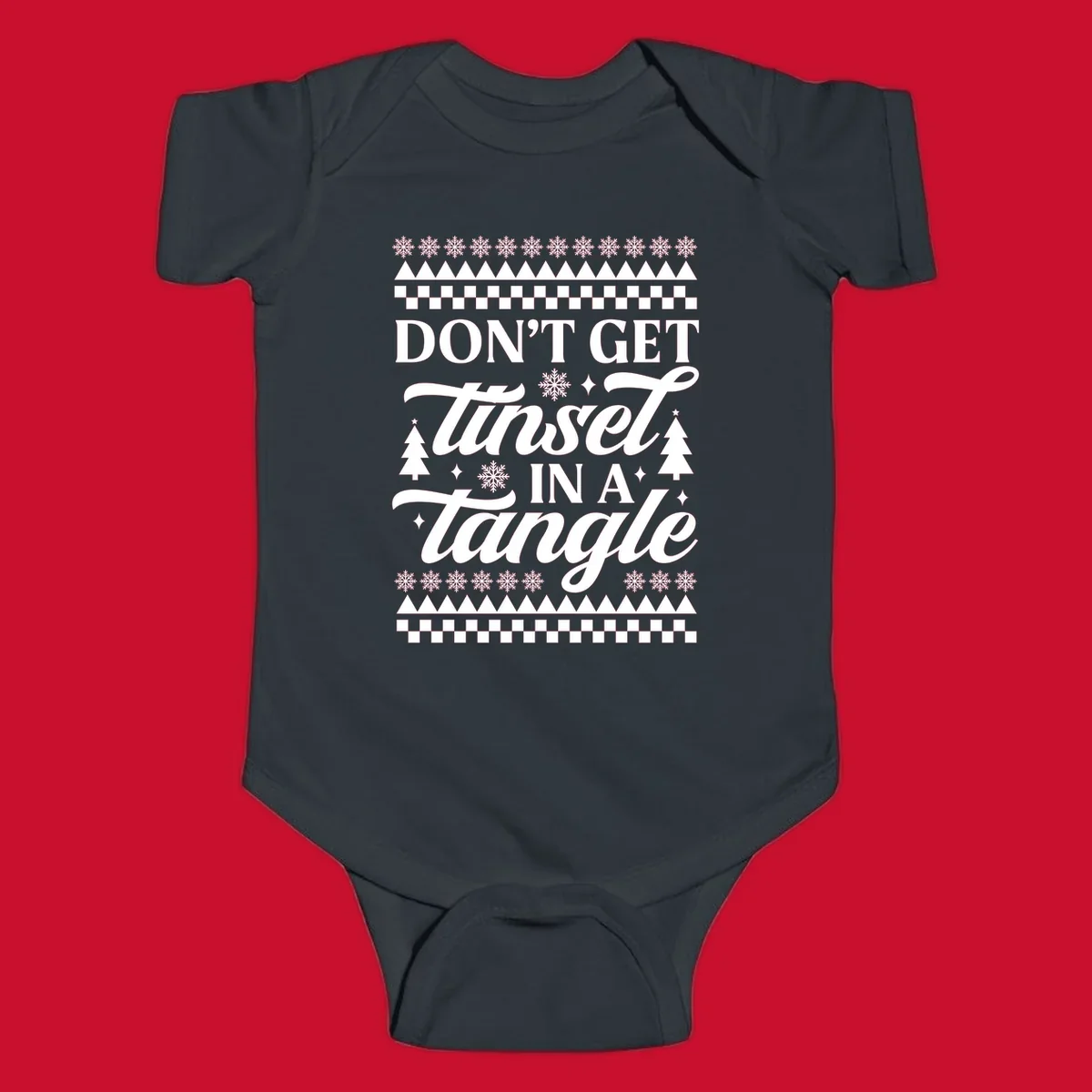 Don't Get Tinsel In A Tangle holiday design with snowflakes and trees.