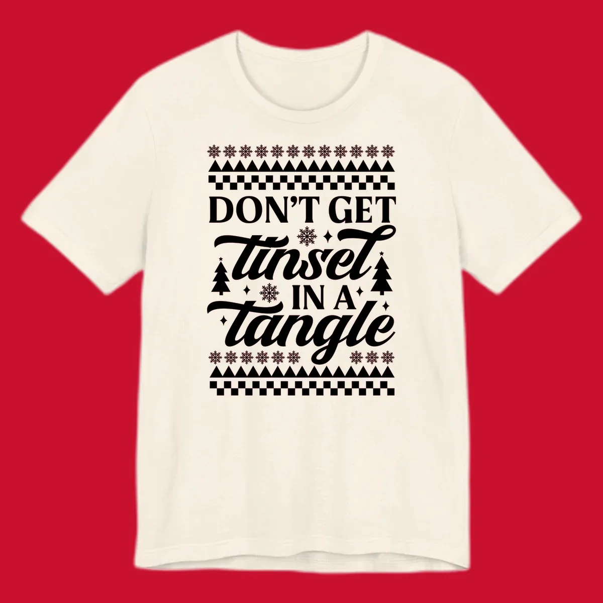 Don't Get Tinsel In A Tangle holiday design with snowflakes and trees.
