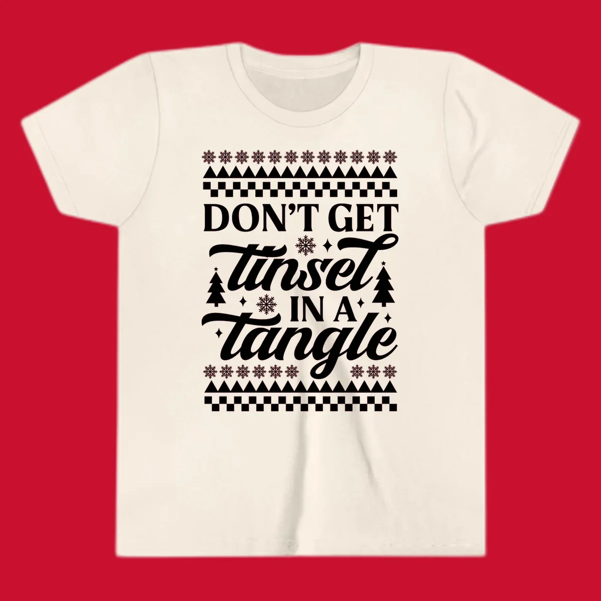 Don't Get Tinsel In A Tangle holiday design with snowflakes and trees.